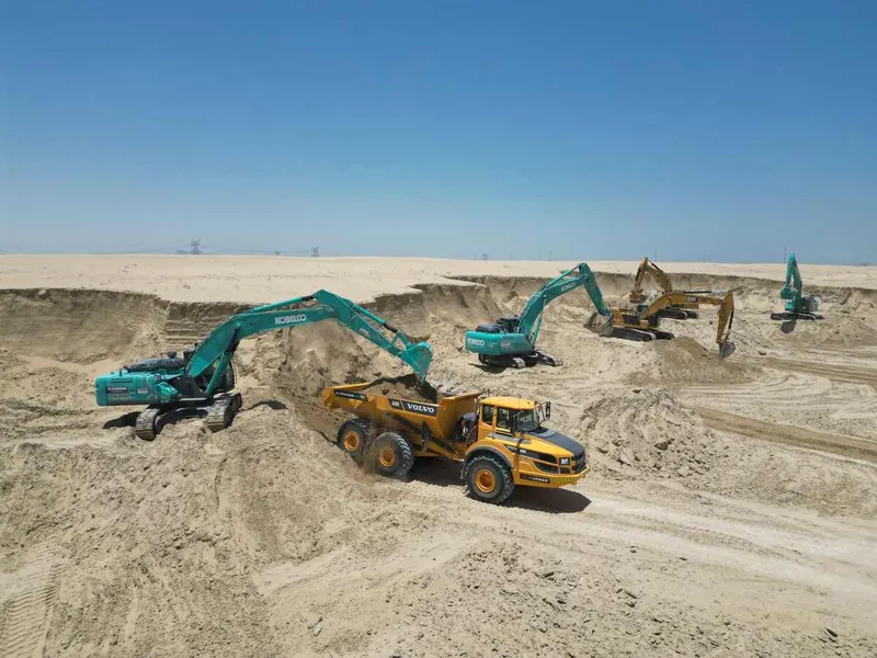 A fleet of Kobelco SK380 excavators