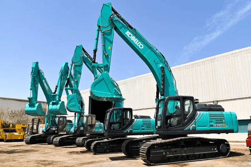 A lineup of KOBELCO medium track excavators in Al Marwan's showroom in JAFZA, Dubai, UAE