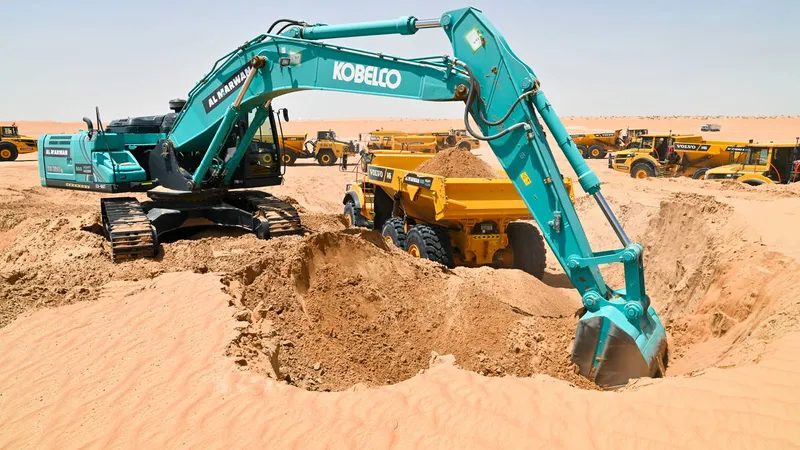 KOBELCO excavator at work in the desert - Al Marwan Machinery