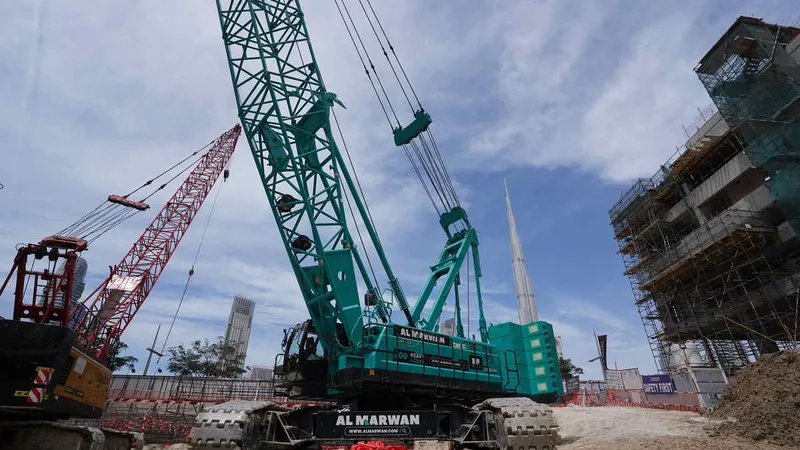 A CKS1350 crawler crane on a Dubai Downtown work site Al Marwan Machinery rental flee