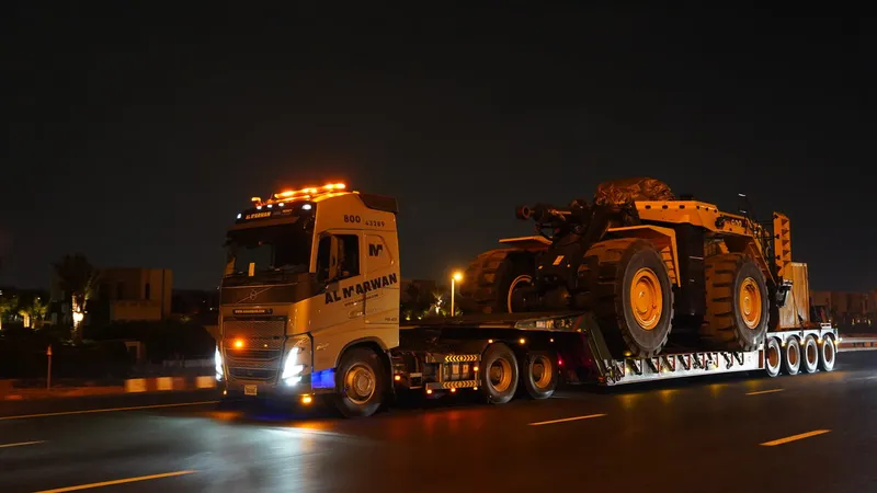 A Komatsu WA900 loader on its way to one of our clients