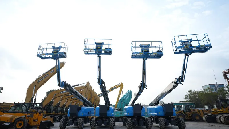 Four AB46 Sinoboom boom lifts