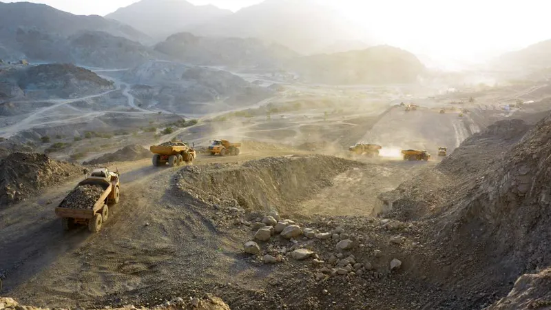 articulated dump trucks on a job site