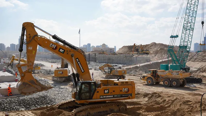 Al Marwan Machinery's equipment rental fleet at Al Layyah Canal project worksite