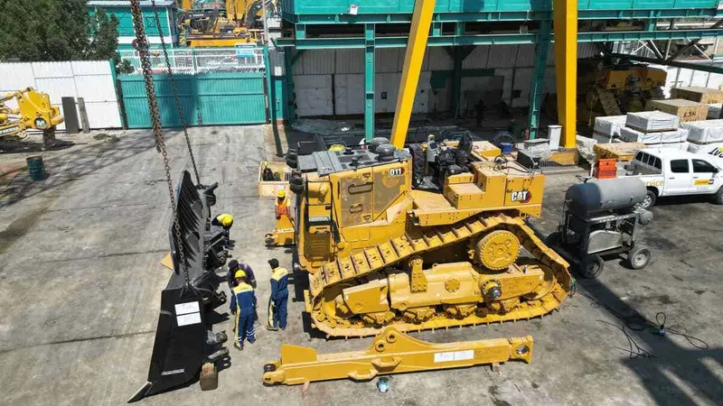 Al Marwan’s technicians assembling a Cat D11
