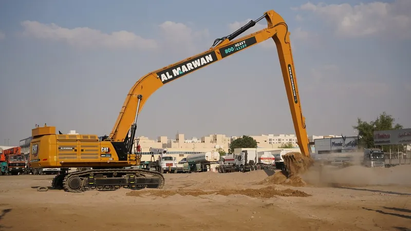 The Caterpillar 395 excavator in a long-boom configuration on Al Marwan Machinery's rental equipment fleet