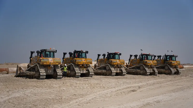 A lineup of Al Marwan's Cat D8T dozers on a remote construction site in Nizwa, Sharjah, UAE