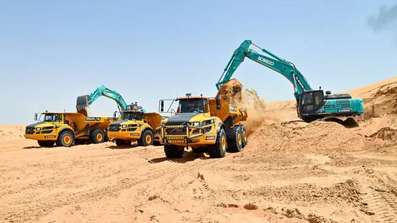 A number of Volvo articulated haulers and KOBELCO excavators in the heavy equipment rental fleet of Al Marwan Heavy Machinery