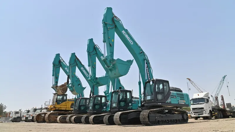A lineup of Al Marwan Machinery's KOBELCO excavators in the medium size class on our Jebel Ali yard in Dubai, UAE