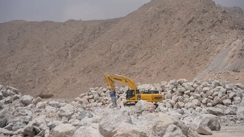 The Komatsu PC500 as part of Al Marwan Machinery's equipment rental fleet working on a quarry site in Oman