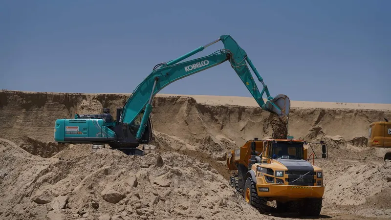 Rental fleet machinery SK380 excavator and A45G dump truck