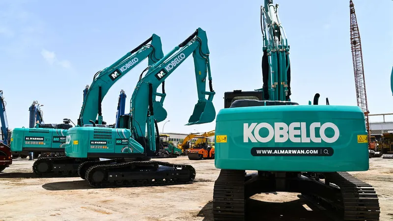 Multiple Kobelco SK220 and SK380 excavators at Al Marwan yard