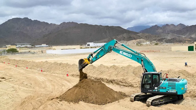 SK220 on Al Kalba job site