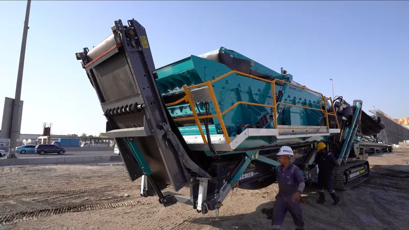 A Picture of an Al Marwan Technician doing a demo of the Chiftain 2100X mobile screener in the Yard of Al Marwan HQ in Sharjah, UAE