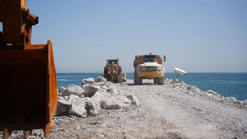 Al Marwan's machinery at work on a marine barriers development project in Oman