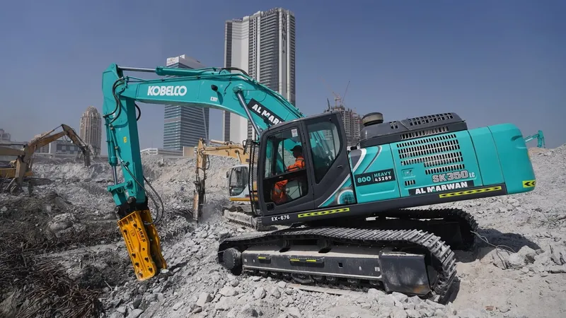 KOBELCO SK380 excavator coupled with a Jisung JSC jackhammer on a demolition job in Dubai