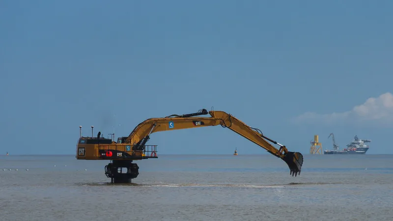 Cat elevated excavator in action
