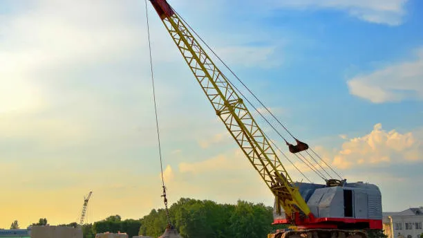 Crawler crane with a wrecking ball