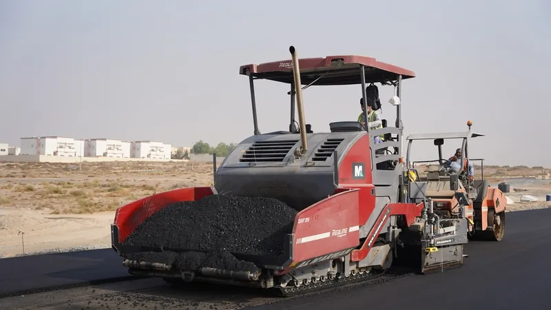 A Dynapac DRF25 track asphalt-laying paver