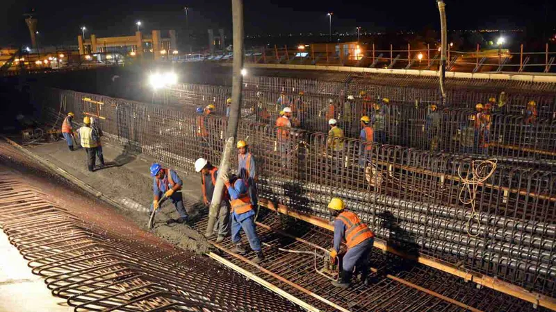 One of Al Marwan's workers uses internal vibrators