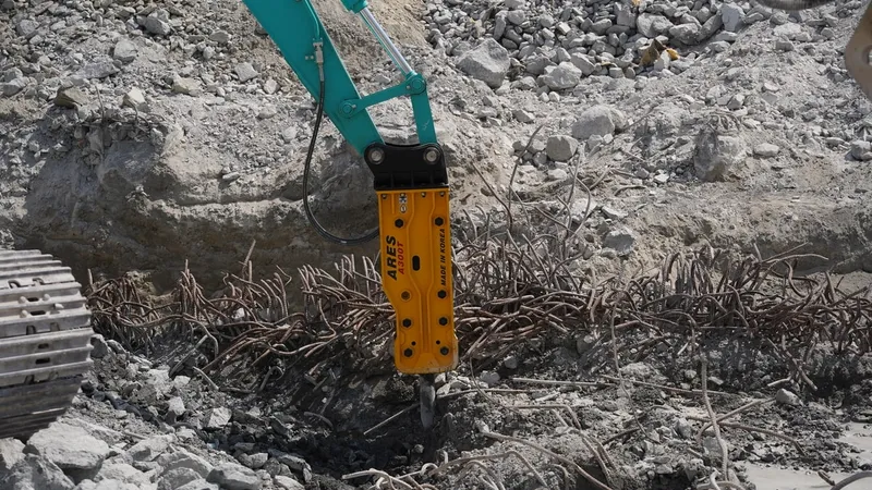 Jisung (JSC) ARES jackhammer fitted on a KOBELCO excavator as a machinery attachment for demo work