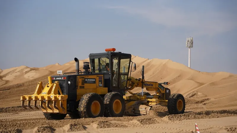 A Komatsu GD775 motor grader