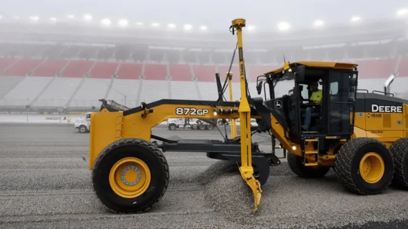 John Deere 872GP motor grader in action