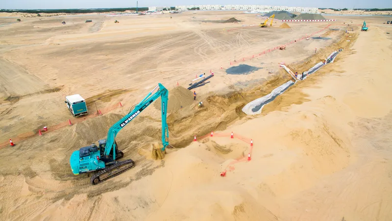Kobelco SK380 long-boom excavator working in Sharjah, UAE