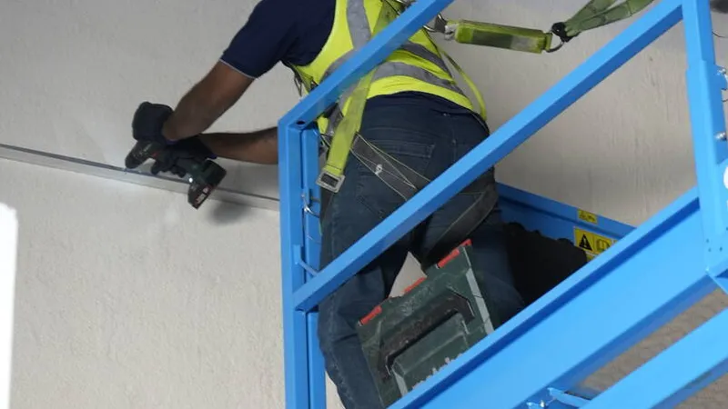 Proper use of a safety harness with a lanyard