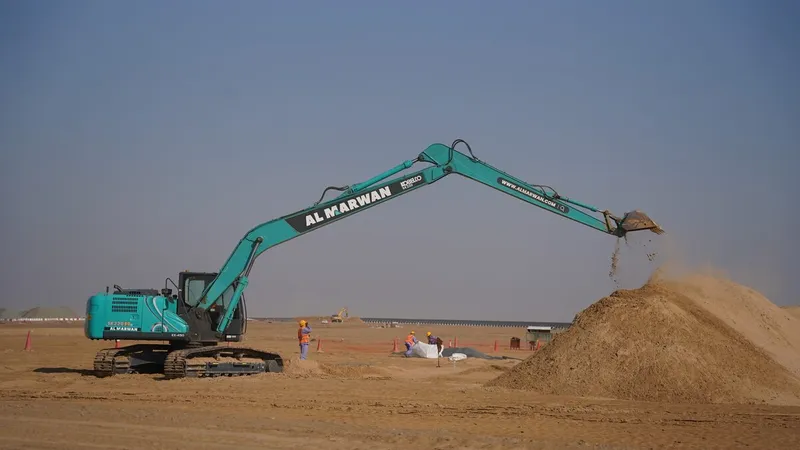 Kobelco SK220 equipped with a long reach boom