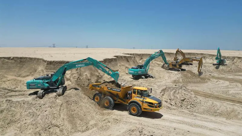 A fleet of Kobelco SK380 excavators