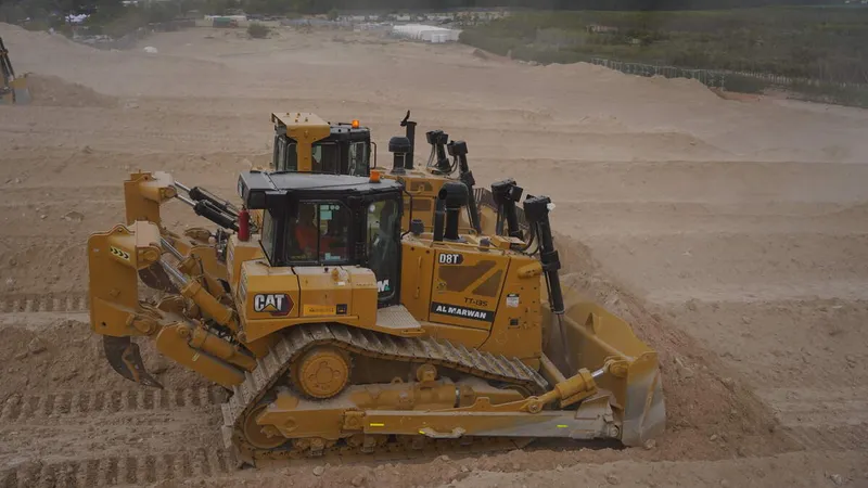Dozers' rippers used to loosen hard materials