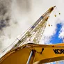 Why Are Kobelco Cranes and Excavators Yellow in the US?