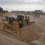 A range of Al Marwan dozers on a job site, like the CAT D8, CAT D9, Komatsu 475A &amp; more