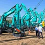 A range of brand new Kobelco excavators and cranes at one of Al Marwan’s yards