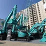Kobelco cranes and excavators on display at Al Marwan Machinery’s booth at the BIG5 UAE 2022