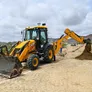 Backhoes are versatile machines used for digging and heavy equipment for landscaping projects