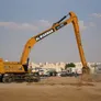A CAT 395 long reach excavator modified in-house by Al Marwan