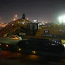 The large CAT 395 long-reach excavator being mobilized to the movie set in Abu Dhabi