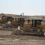 Multiple CAT D8T crawler dozers on an Al Marwan job site in Abu Dhabi, UAE