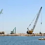 Various Al Marwan crawler cranes on a Oman job site, including the Kobelco CKS1350 crawler crane