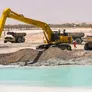 Caterpillar 740 dumpers working seamlessly with long boom excavators on Al Marwan’s BaniYas project