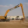 The Caterpillar 395 excavator in a long-boom configuration on Al Marwan Machinery's rental equipment fleet