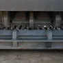 Crushing shafts of a World Attachments screening bucket