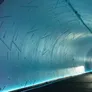 A Tesla electric vehicle passing through the underground tunnel