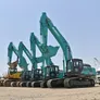 A lineup of Al Marwan Machinery's KOBELCO excavators in the medium size class on our Jebel Ali yard in Dubai, UAE
