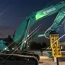 Lineup of KOBELCO excavators as showcased on Al Marwan Machinery's stand at Project Oman 2023