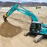 Al Marwan Kobelco SK220 on a construction site