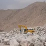 The Komatsu PC500 as part of Al Marwan Machinery's equipment rental fleet working on a quarry site in Oman
