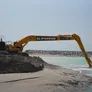 A Komatsu PC850 long boom excavator on Al Jaraf worksite